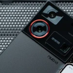 Close-up of a Nubia smartphone featuring a dual-camera system on a textured surface.