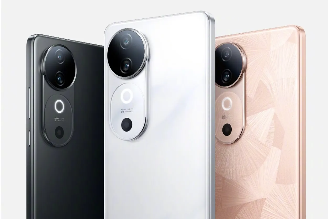 Trys modernaus dizaino išmanieji telefonai su pažangia kamera, juodos, baltos ir auksinės spalvos.