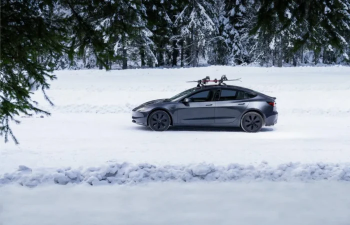 tesla model 3 highland us logo winter snow scaled 1