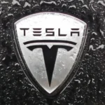 tesla motors logo badge scaled e1758093659835 1184x592 1